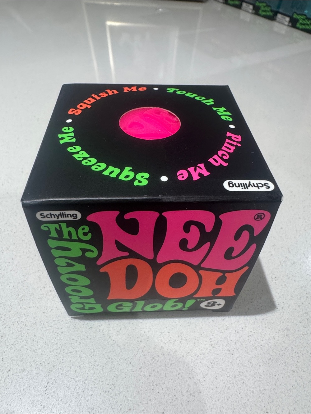 Schylling Groovy NeeDoh Pink Sensory Squish Toy